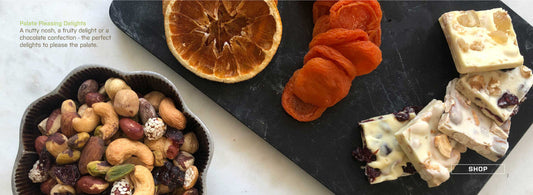 different snacks including nuts, dried fruits and white chocolate