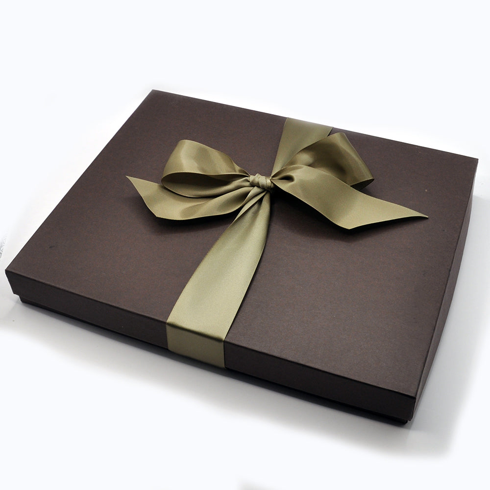 chocolate gift box with green bow 